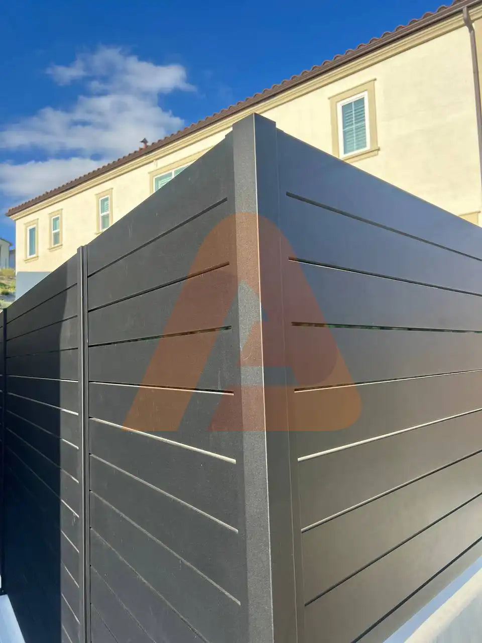 Black ALU 40 aluminum slat fence with narrow gaps between slats
