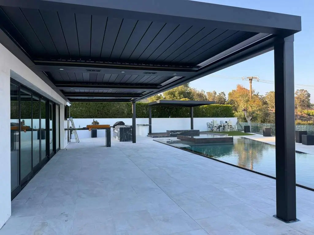 40 ft Monster Tank louver patio by the pool before the integrated lights are switched on